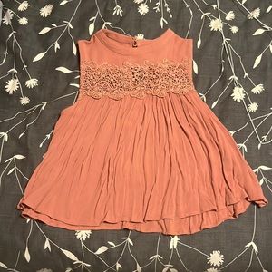 Pink sleeveless blouse